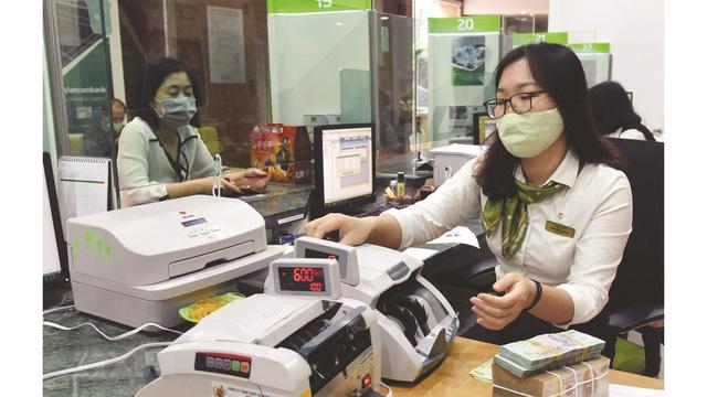 Ngân hàng đã cố gắng hết sức hỗ trợ doanh nghiệp - Ảnh 1. Ngân hàng đã cố gắng hết sức hỗ trợ doanh nghiệp - Ảnh 1.