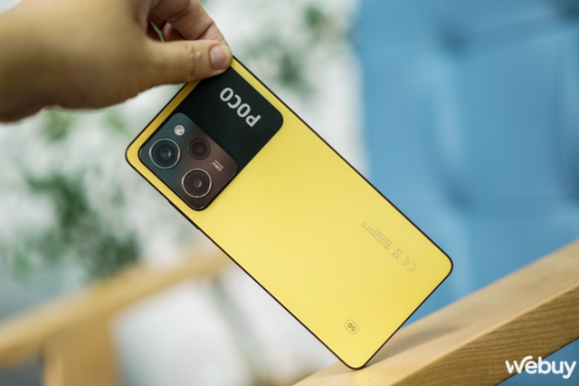 Mở hộp POCO X5 Pro 5G tại Việt Nam: Tông vàng đen lạ mắt, màn hình 120Hz và camera 108MP - Ảnh 1.