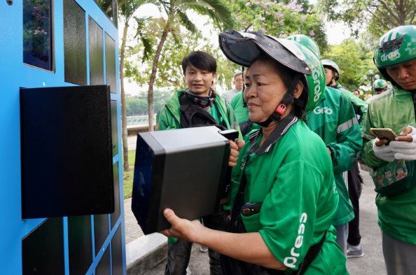 Thị trường xe điện thêm "nóng": Tài xế Grab bắt đầu thư nghiêm sử dụng xe máy điện giao hàng tại TP.HCM - Ảnh 2.