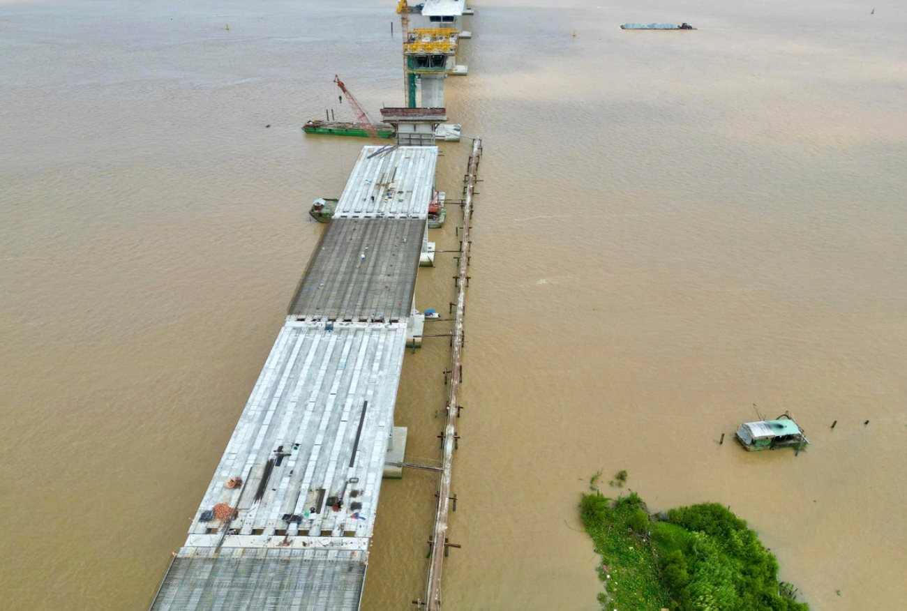 Tin vui cho Nhơn Trạch (Đồng Nai): Cây cầu gần 7.000 tỉ đồng hợp long nhịp đầu tiên, sân bay lớn nhất nước tăng tốc “về đích”- Ảnh 1.