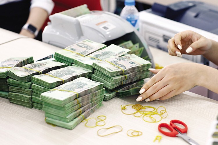 Các ngân hàng đồng loạt khởi động kế hoạch tăng vốn. Ảnh minh hoạ