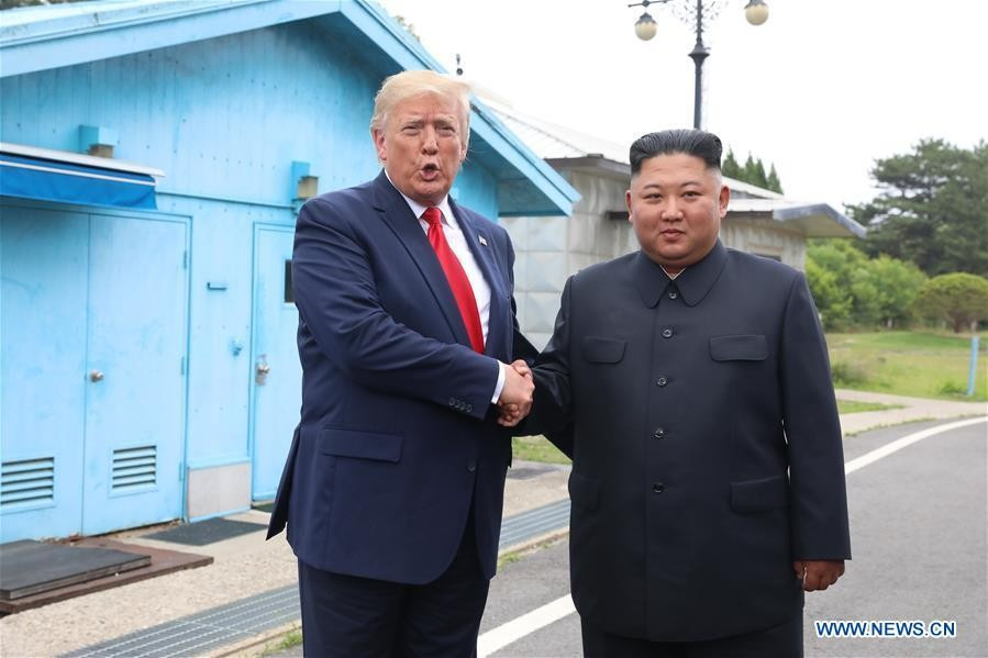 Tổng thống Mỹ Donald Trump và Chủ tịch Triều Tiên Kim Jong Un trong cuộc gặp năm 2019. Ảnh: Xinhua foreign201907010735000389684475965.jpg